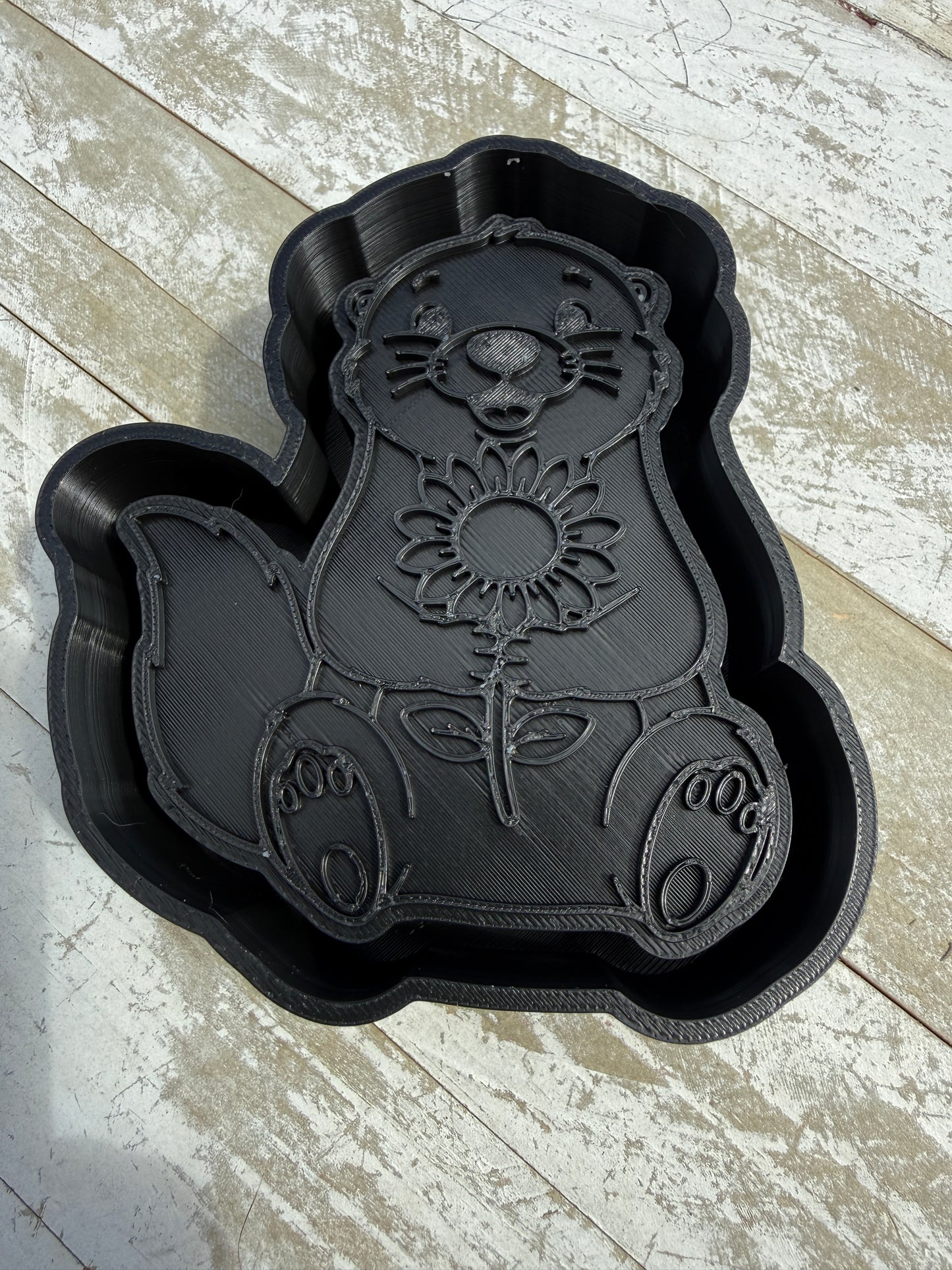 Otter with flower mold