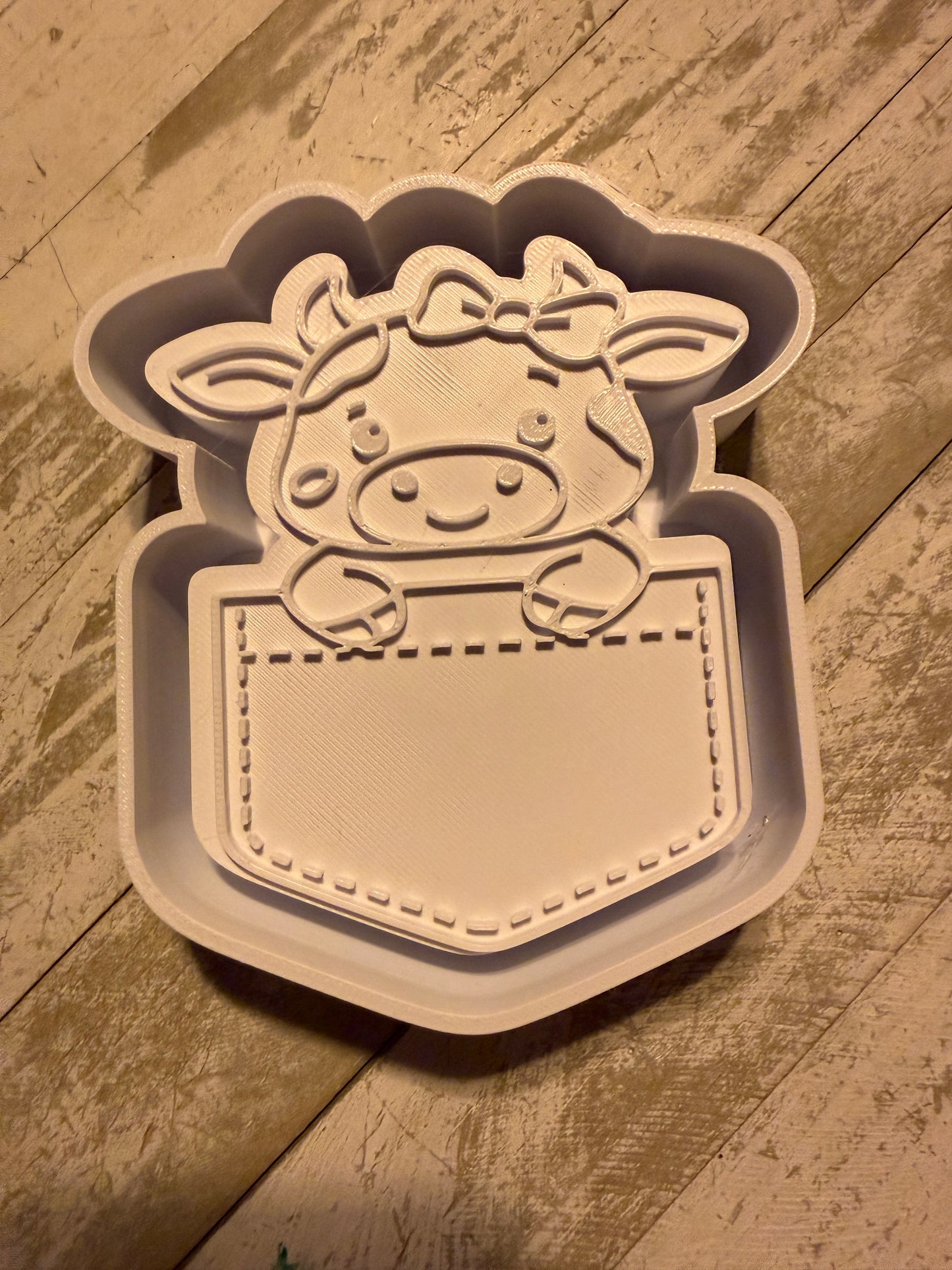 Cow in a pocket mold