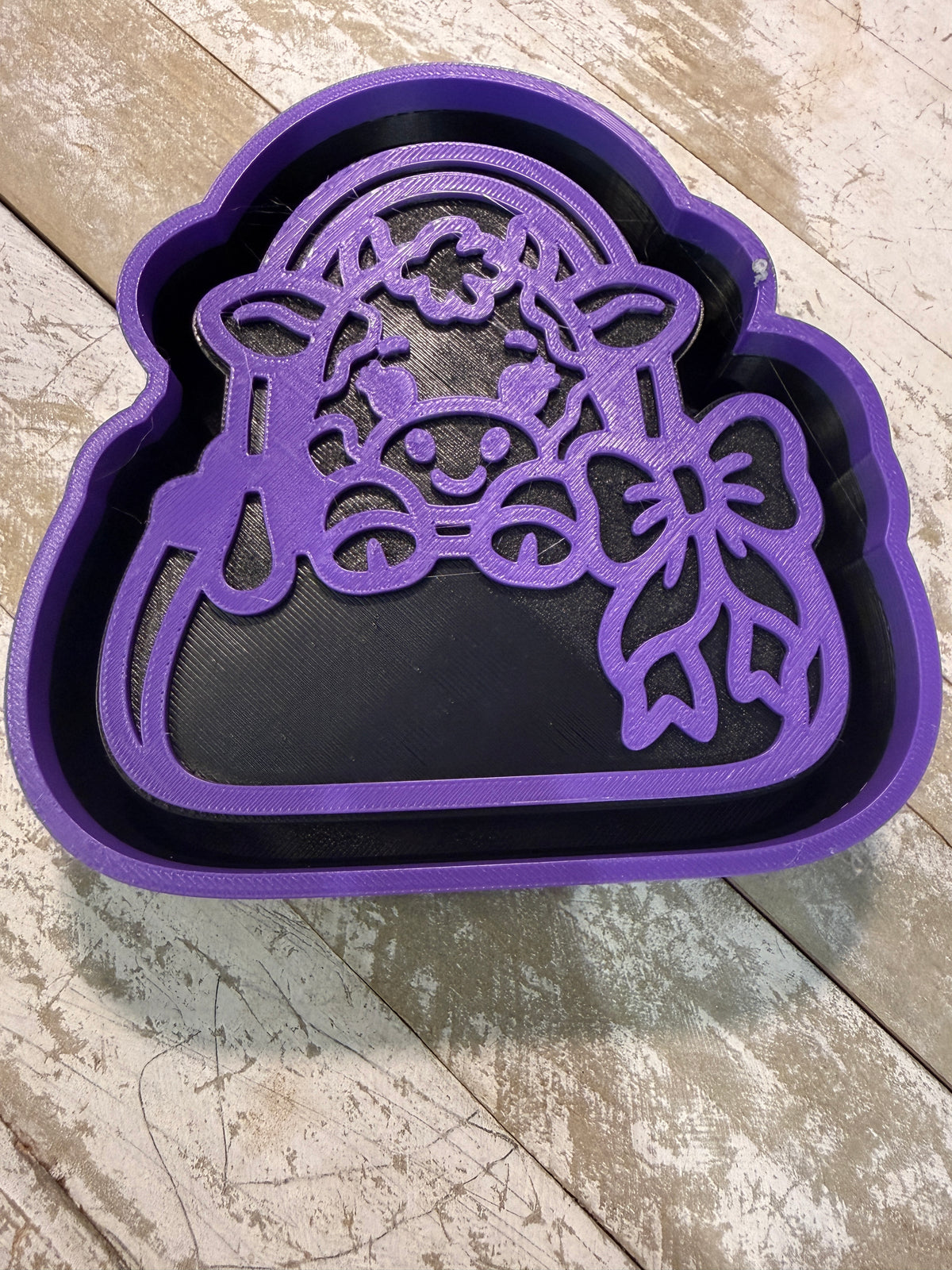 Cow in a purse mold