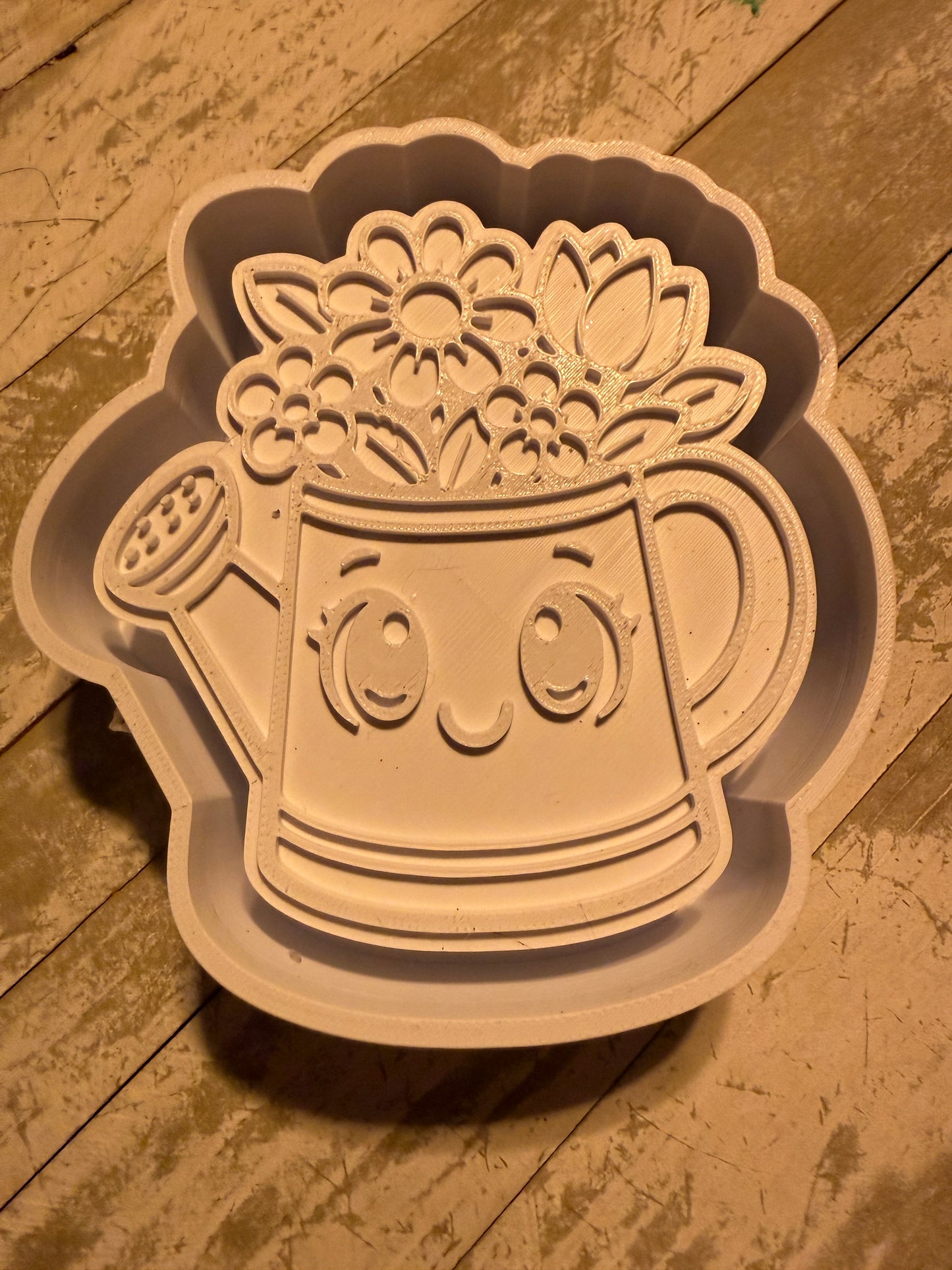 Watering can with flowers mold