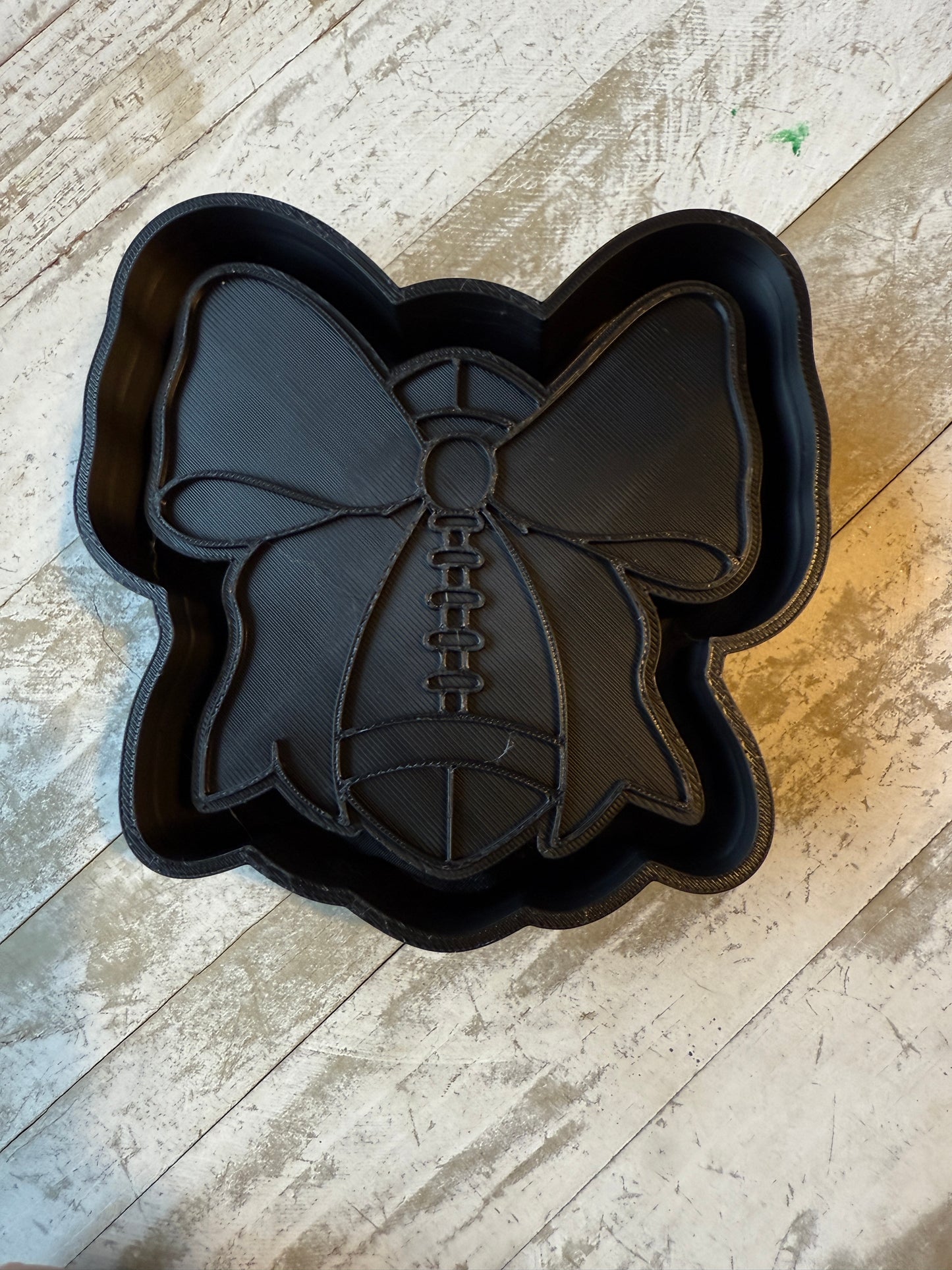 Football with bow freshie mold