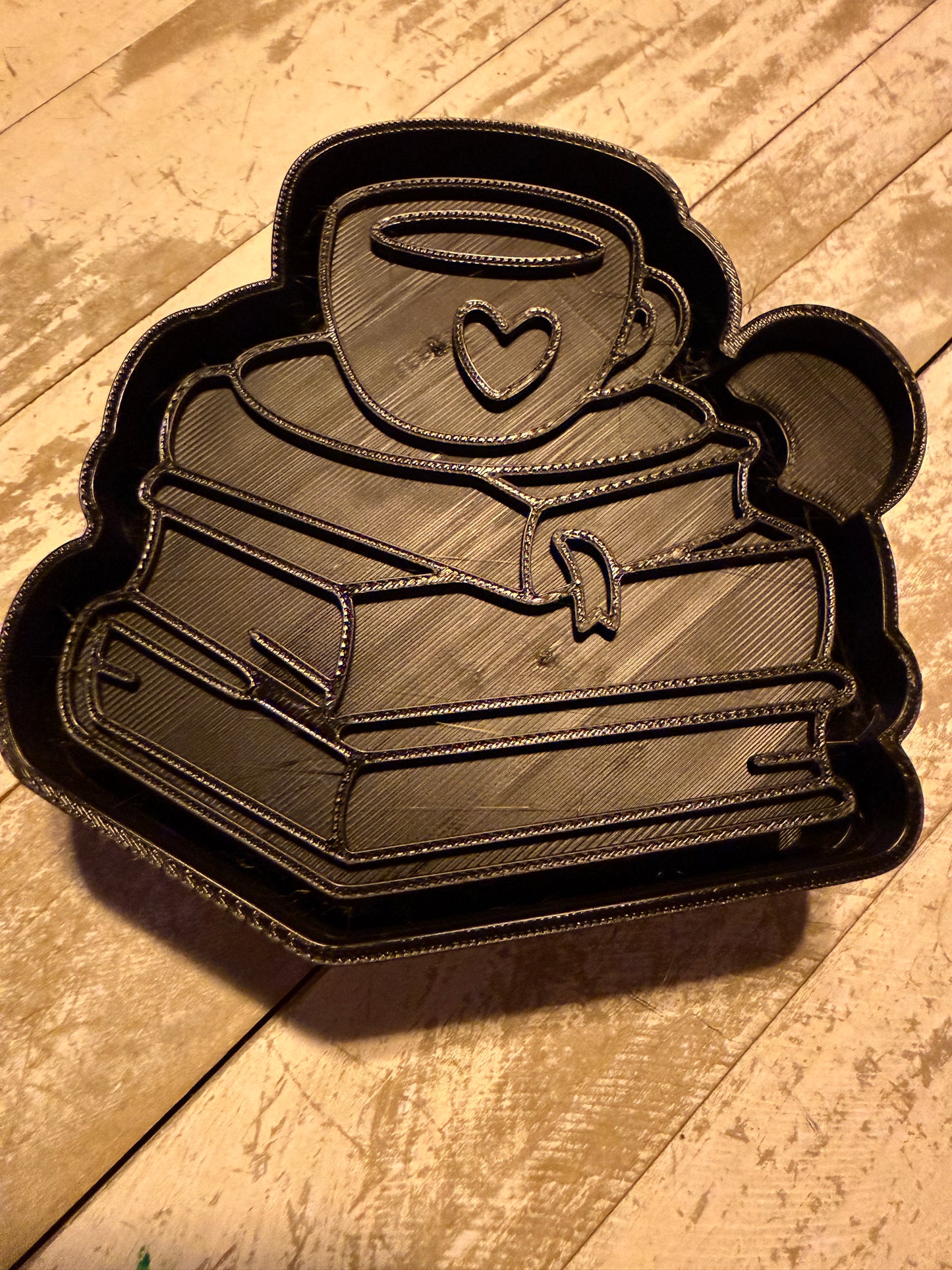 Books and coffee mold