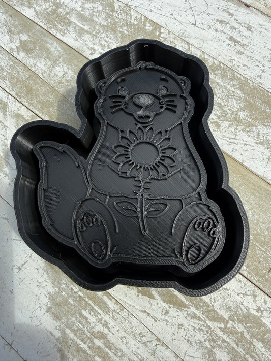 Otter with flower mold