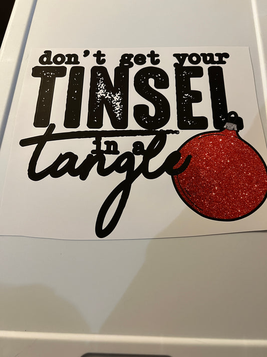 Tinsel in a tangle design