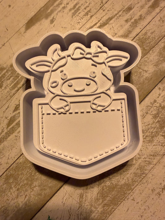 Cow in a pocket mold