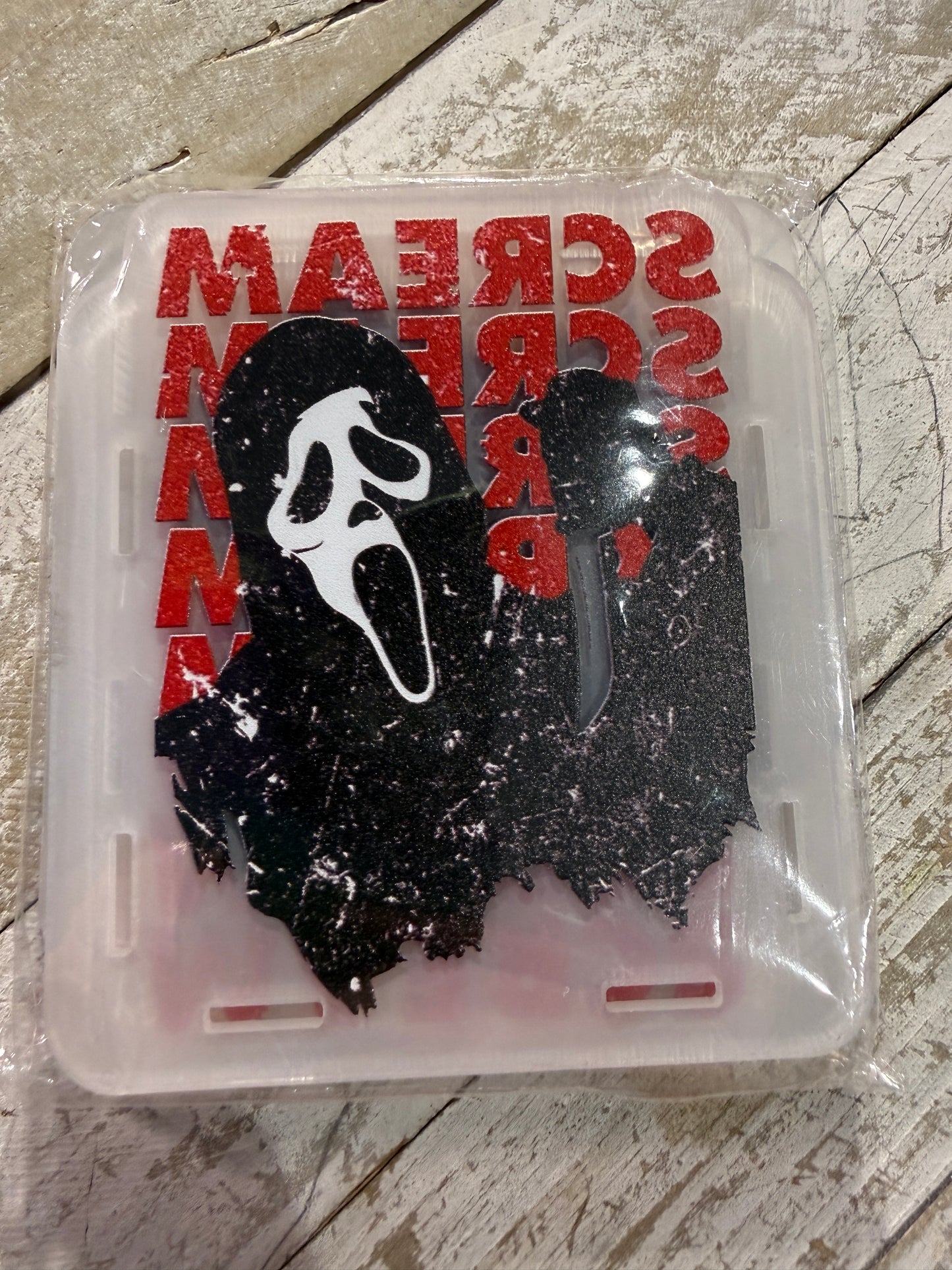 Scream acrylic holder