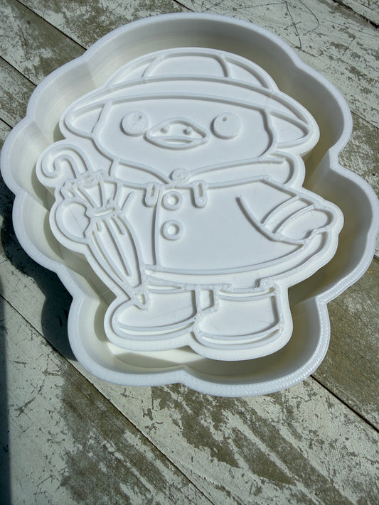 Duck with raincoat mold
