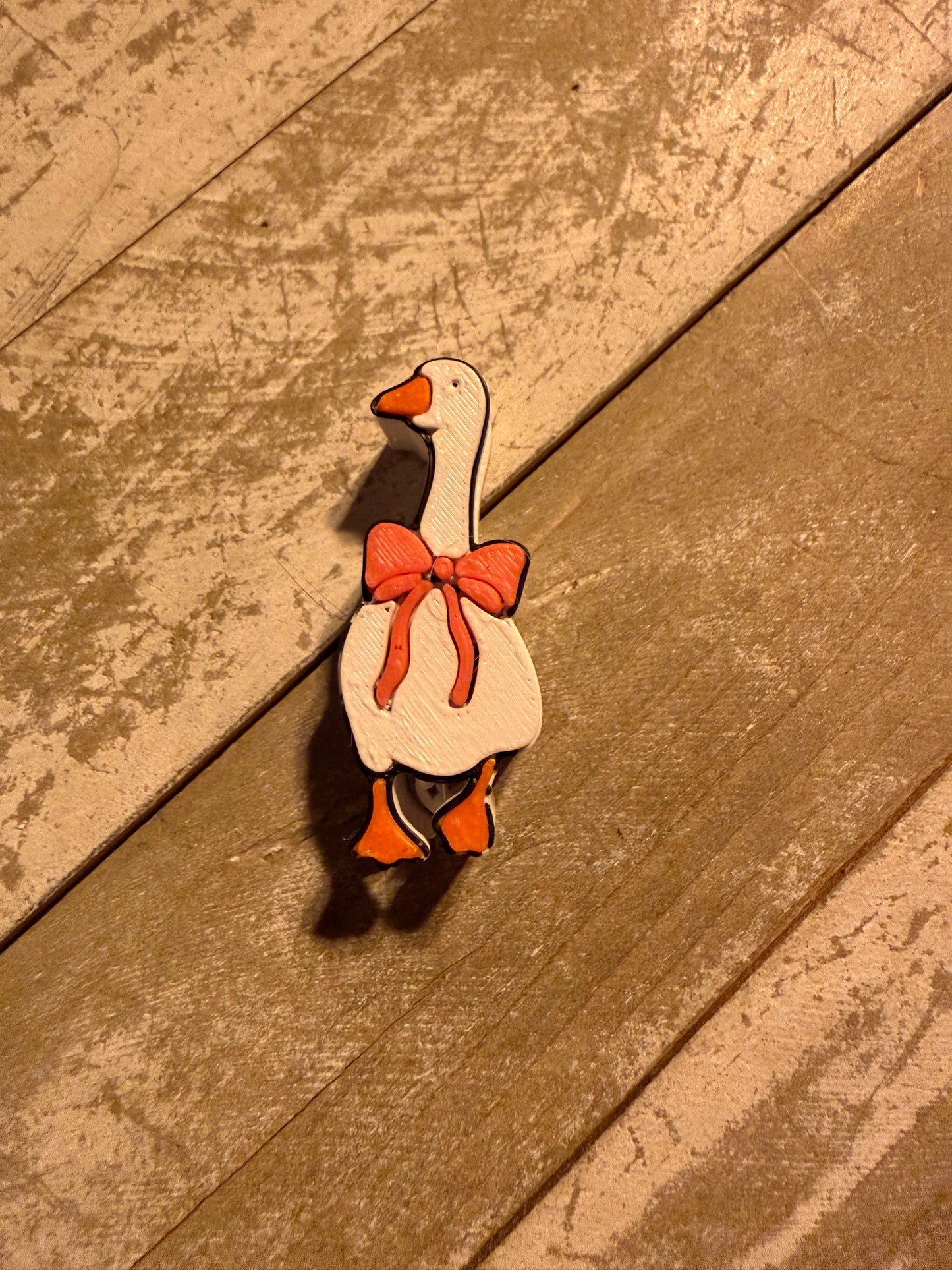 Goose with bow straw topper