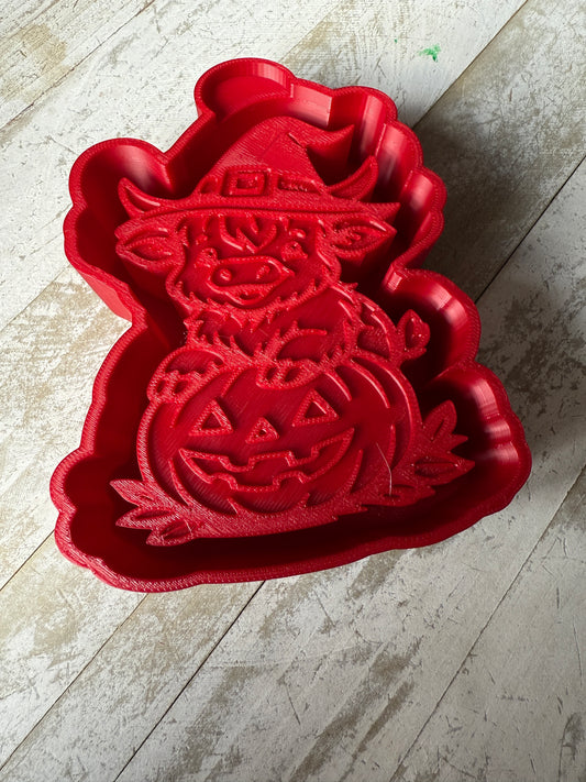 Cow with pumpkin mold