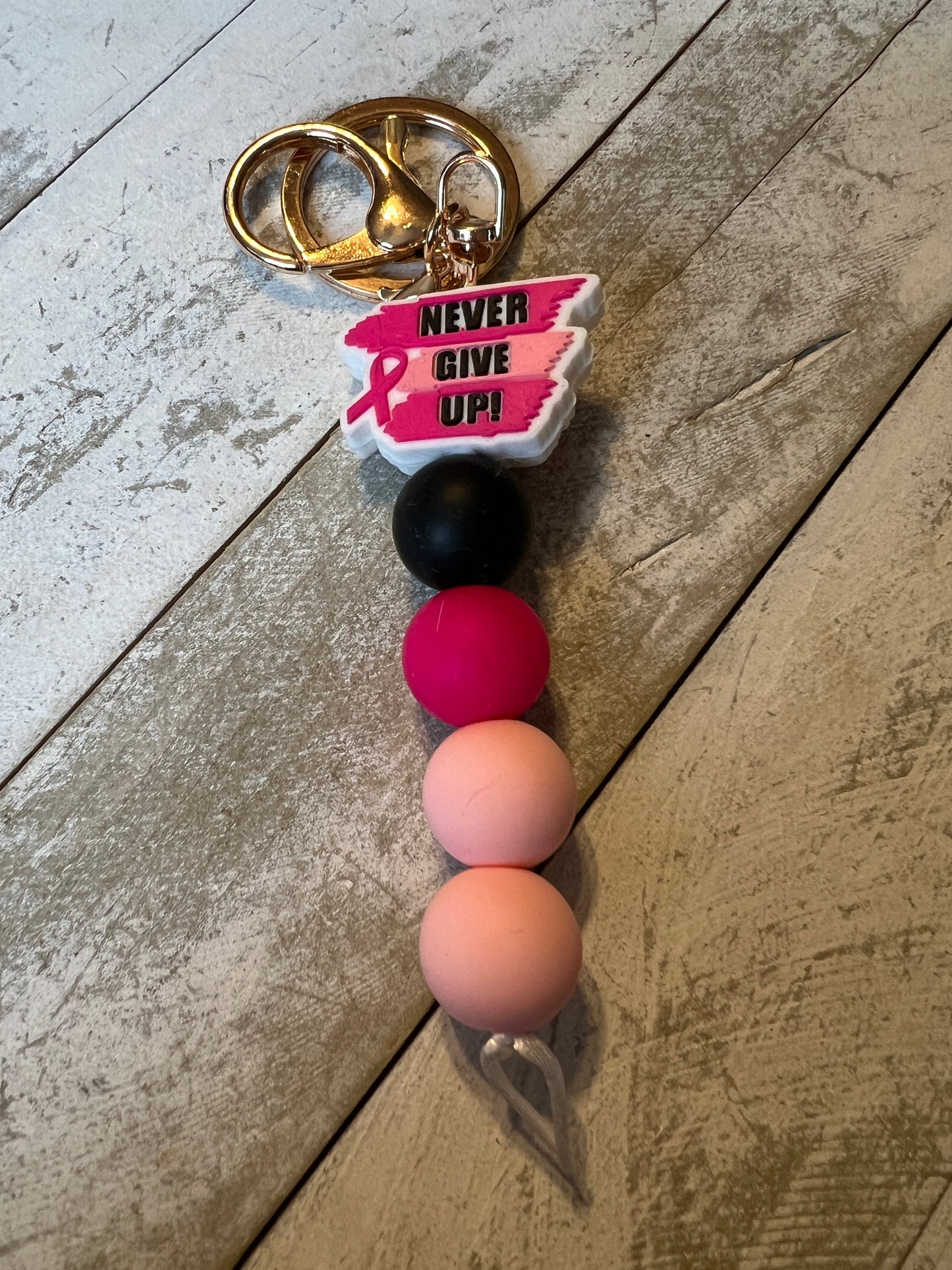 Never give up key chain