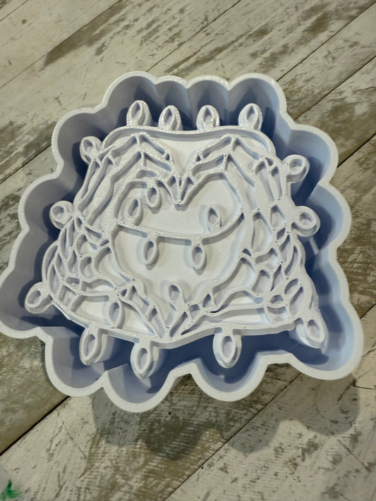 Hands with heart and lights mold