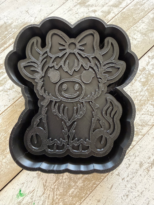 Cow with bow mold