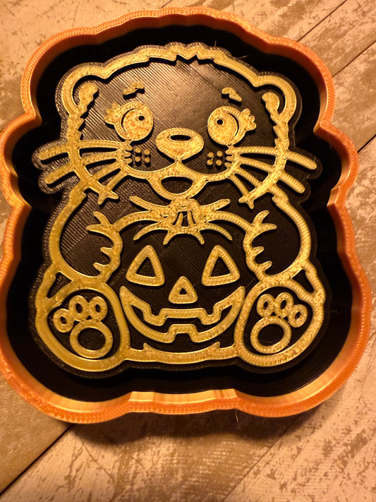 Otter with pumpkin mold