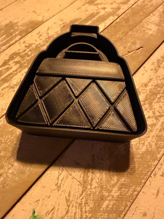 Purse vent clip mold