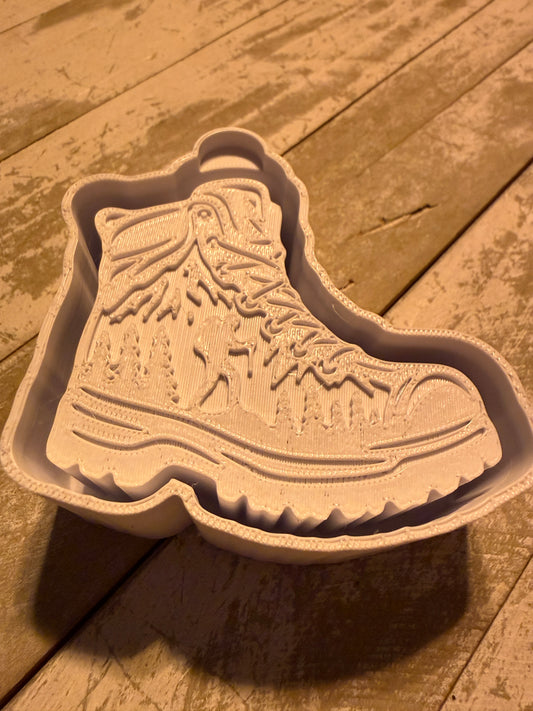 Boot with outdoor scene vent clip mold